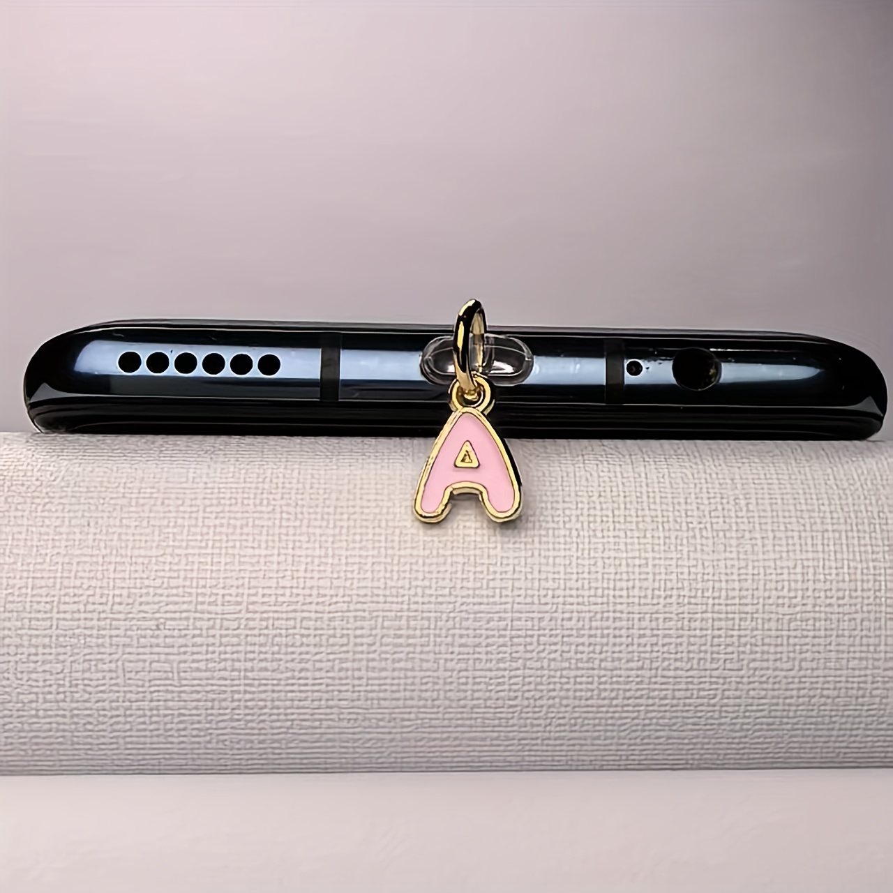 سدادة غبار للهاتف بحروف إنجليز - مراجعة Phone Accessories Background وسعره